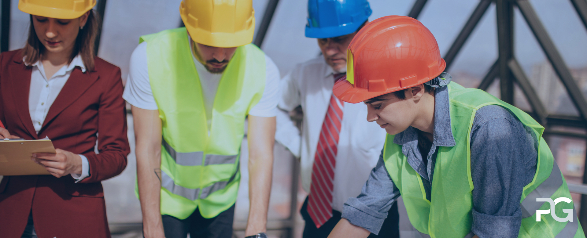Construction project team reviewing plans on-site