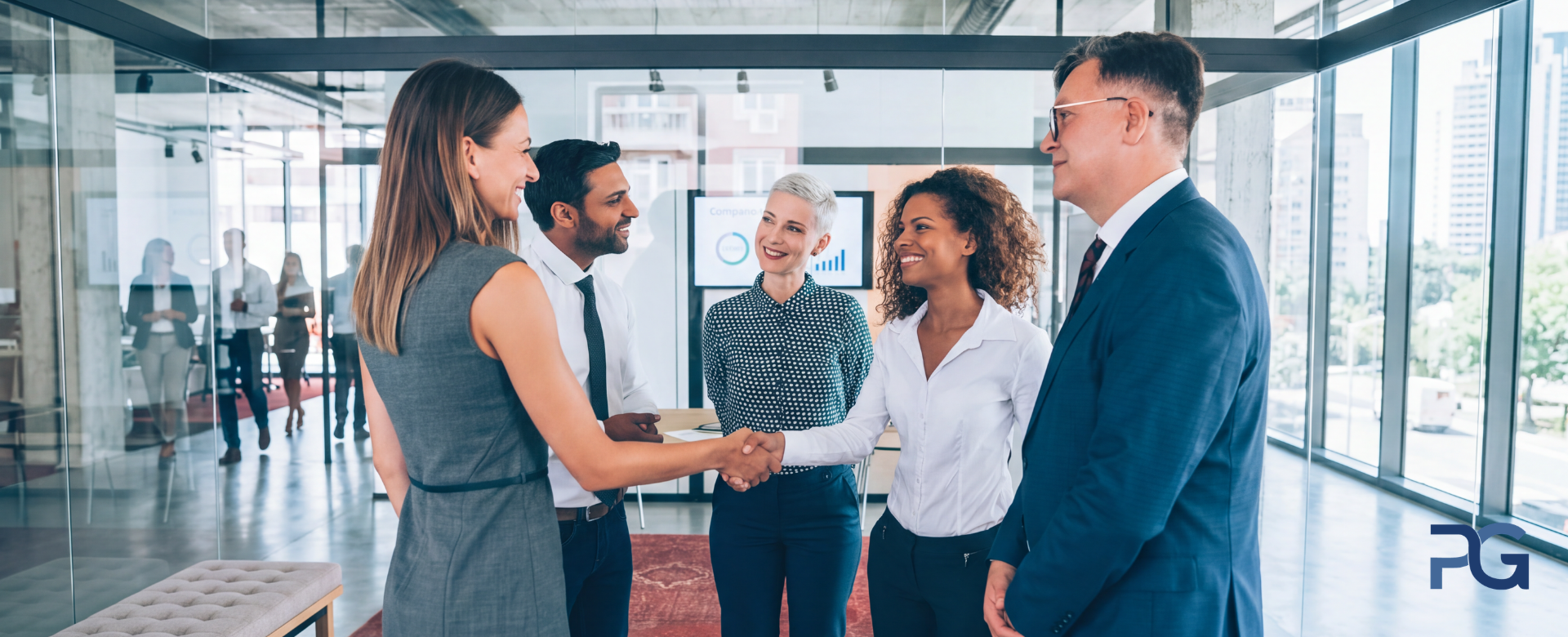 A group of executives in a meeting, getting to know each other and working together.